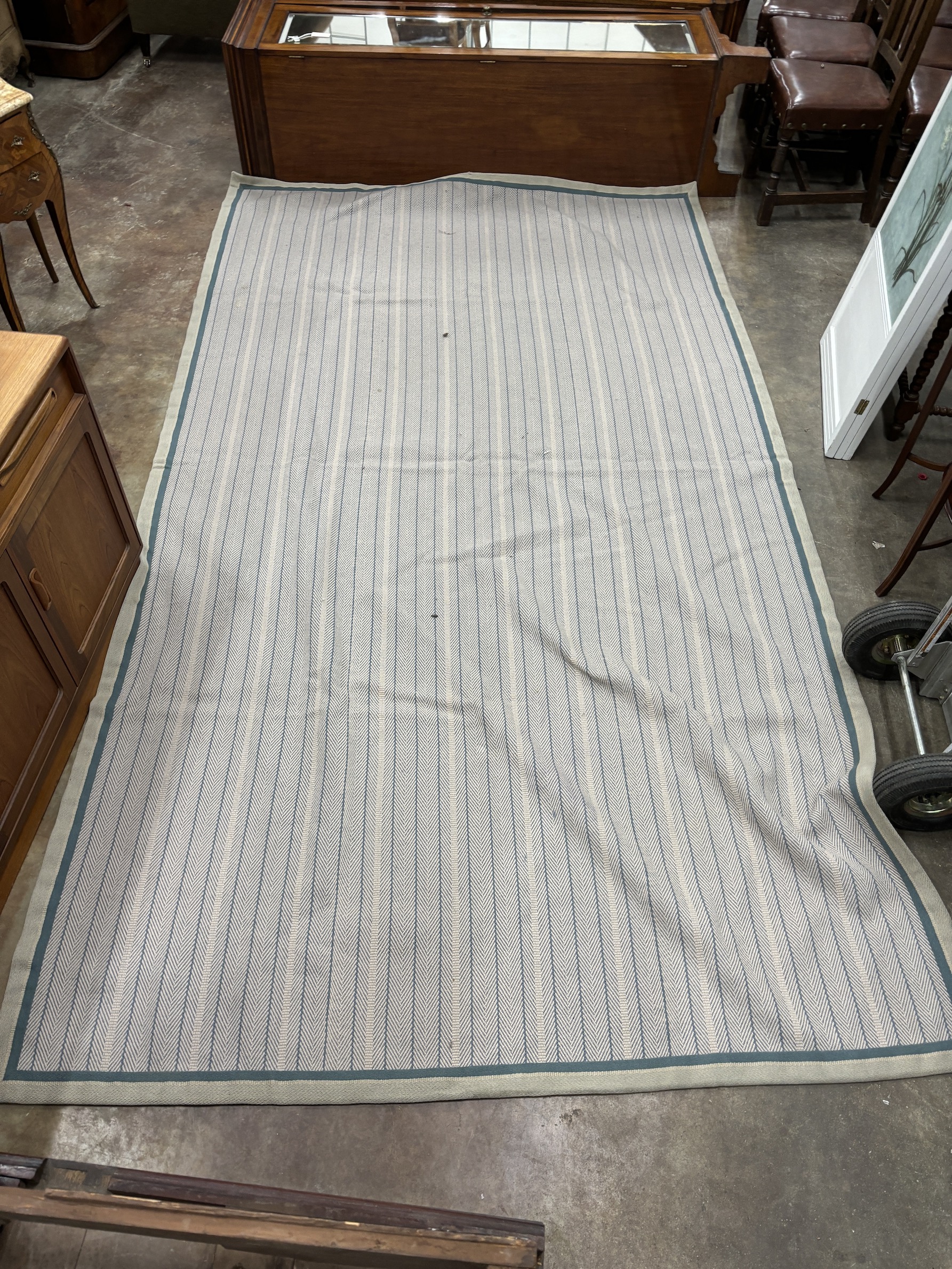 A large contemporary Roger Oats Design Herringbone pattern carpet with reversible design. 358cm x 197cm